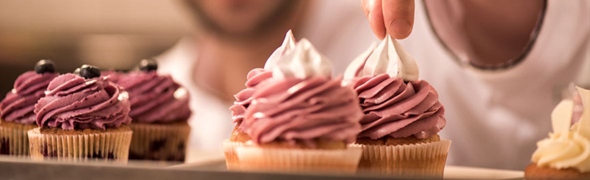 pastry chef prepares cake